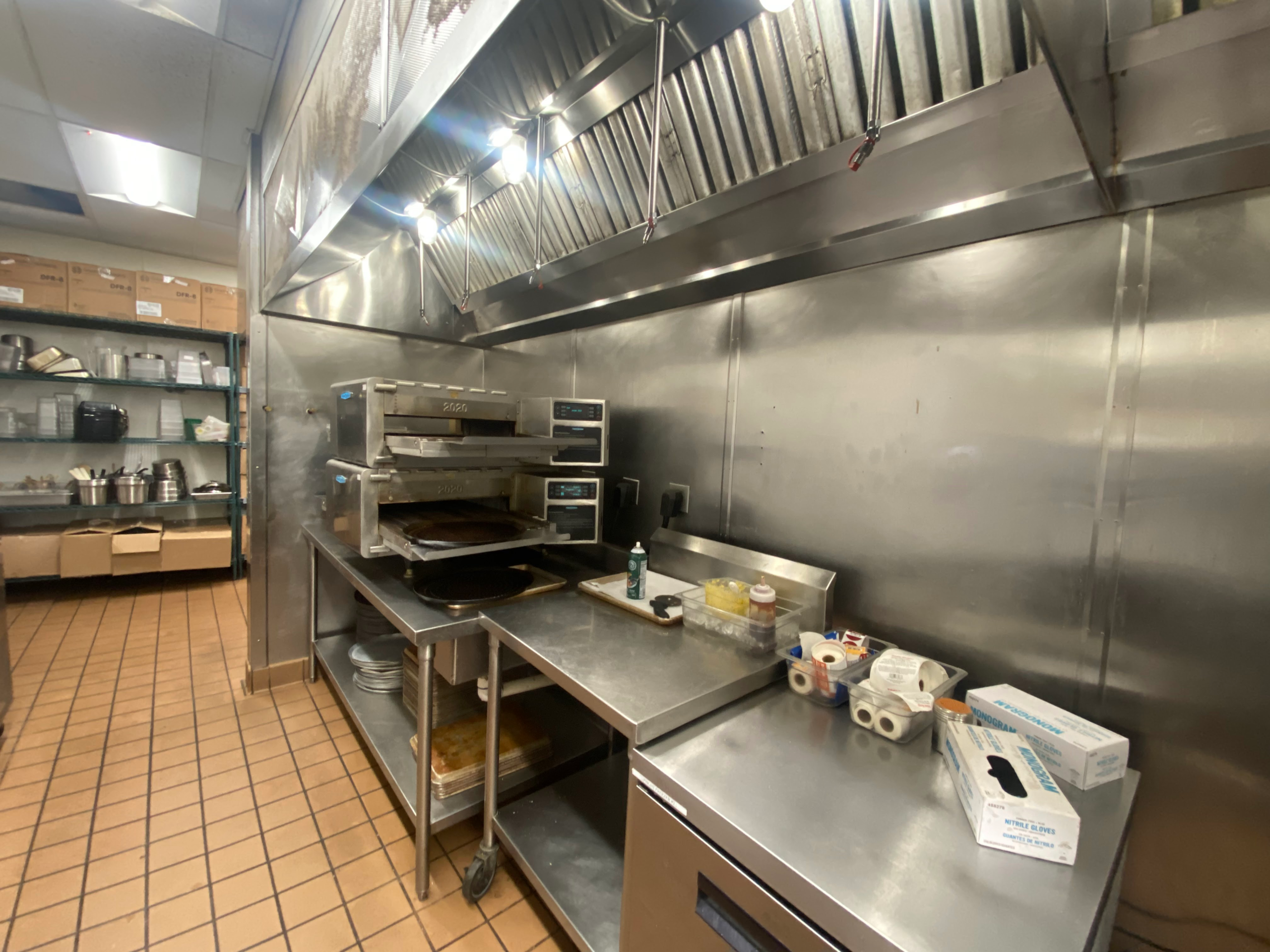 Commercial exhaust hood with grease buildup removed