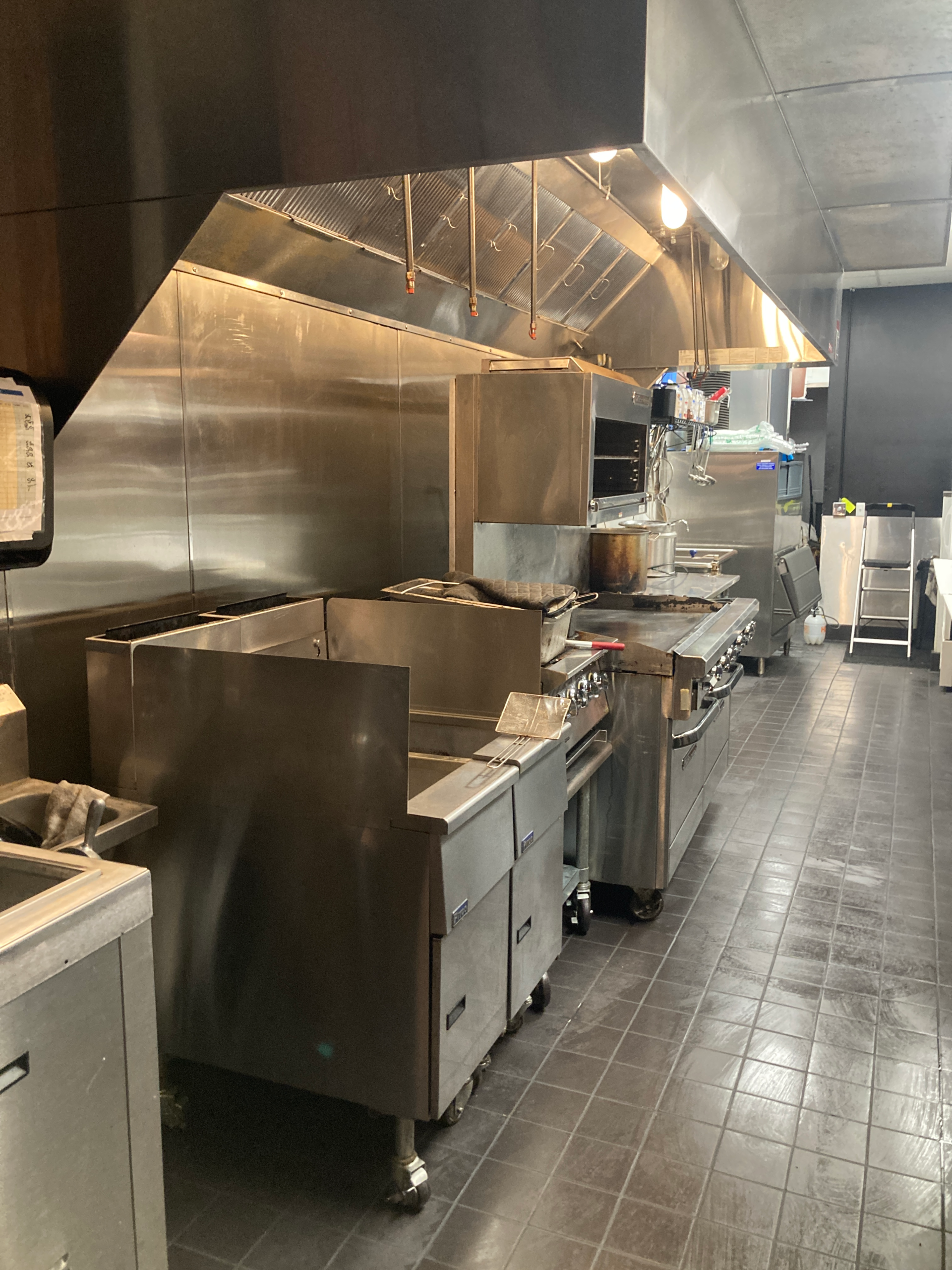 Kitchen hood cleaned to remove grease and residue