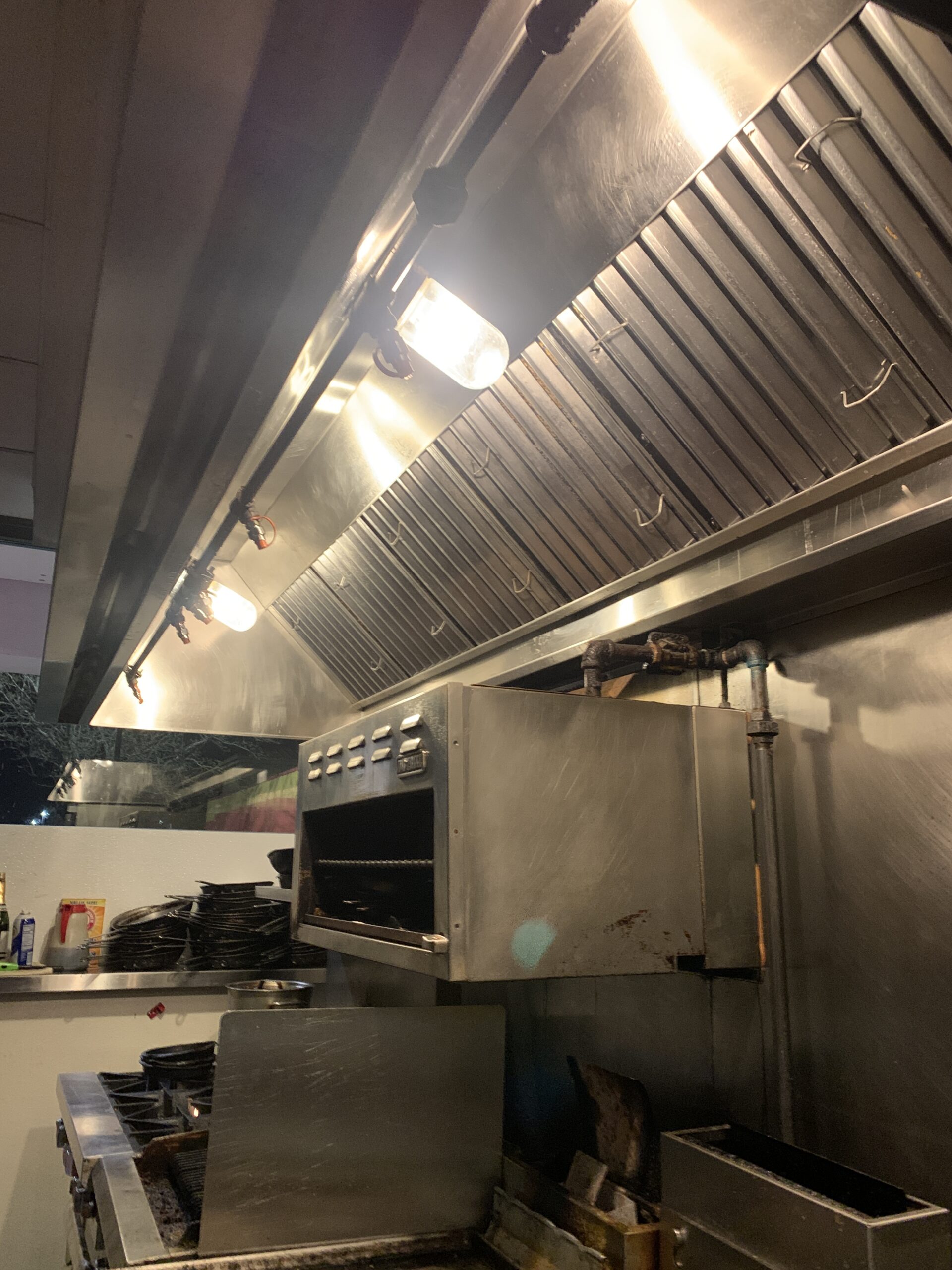Clean kitchen exhaust hood ready for inspection